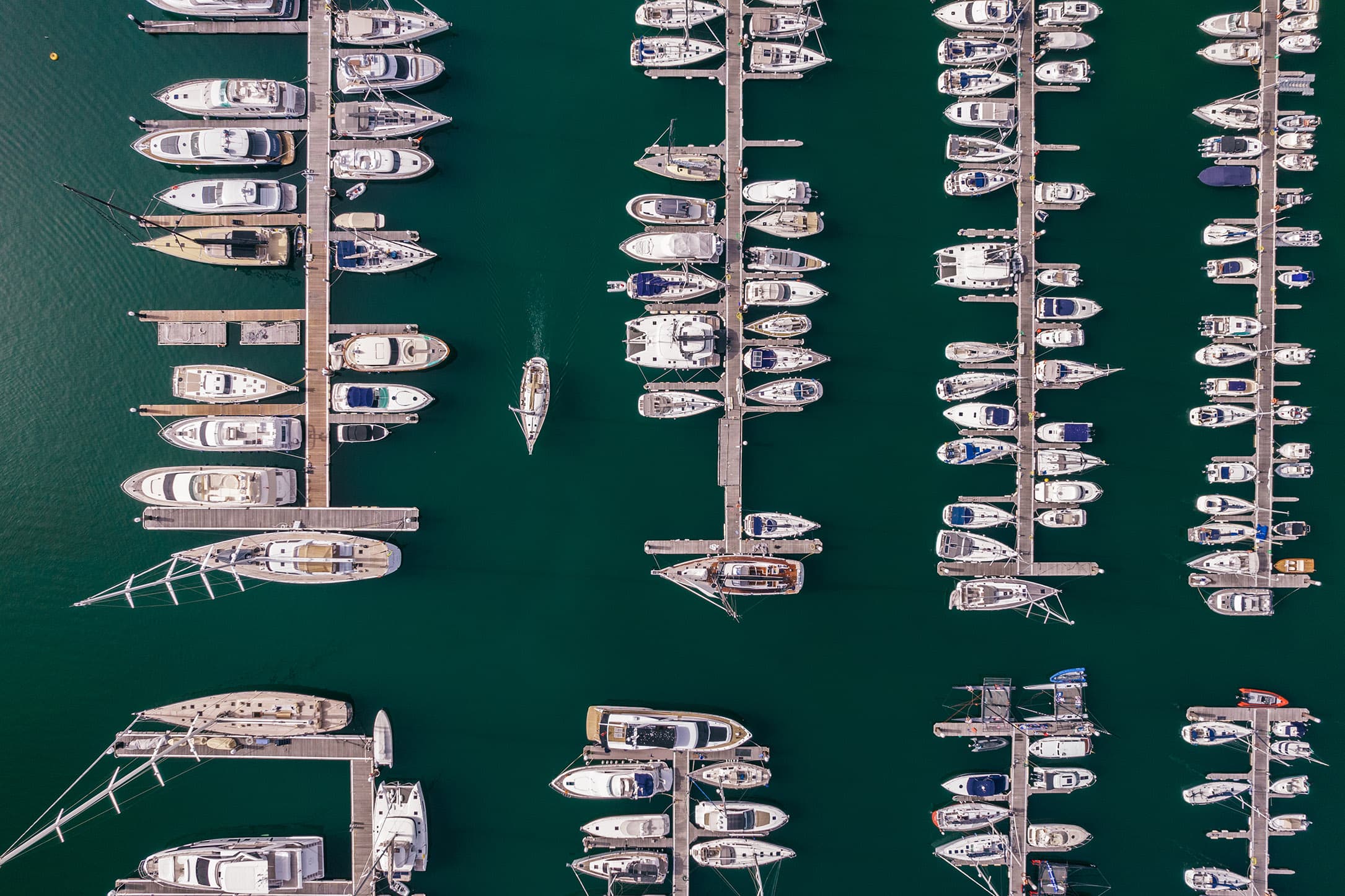 Overhead aerial view of a dock and waterway — representing custom AI detection solutions